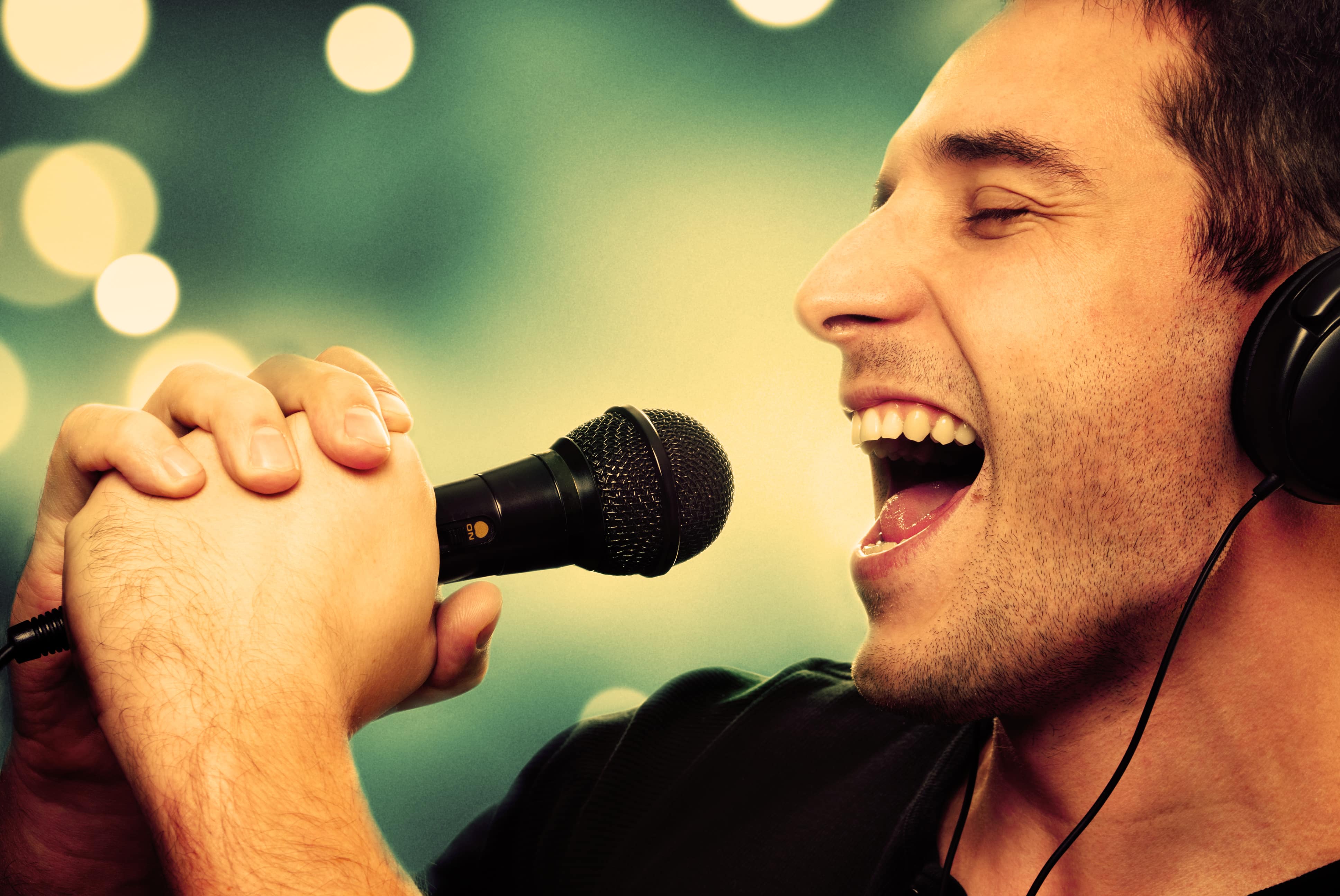Retro image of man singing into microphone