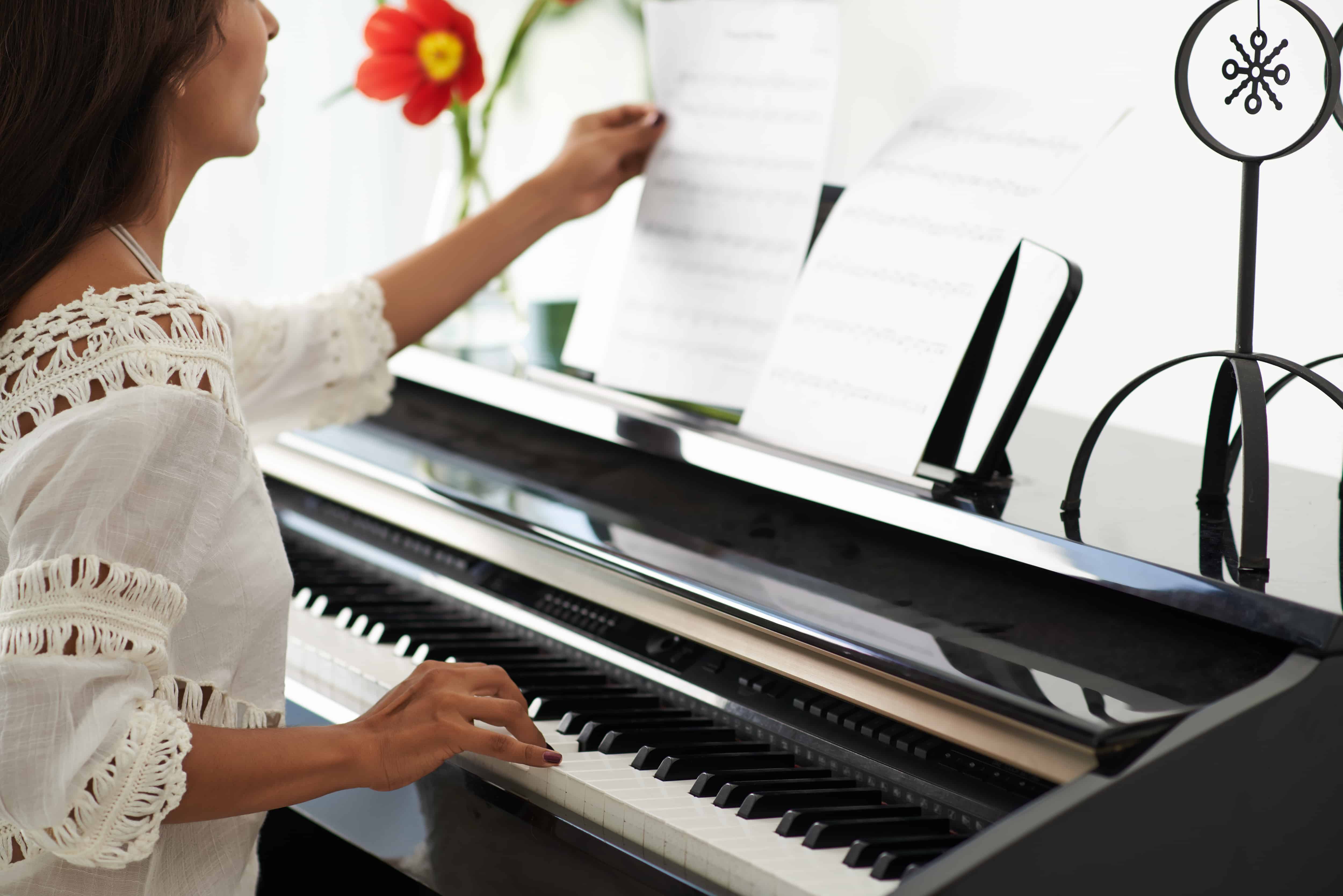 Woman musician Woman playing piano